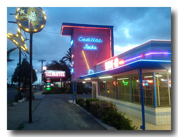 Cadillac Jacks & Pink Motel at night